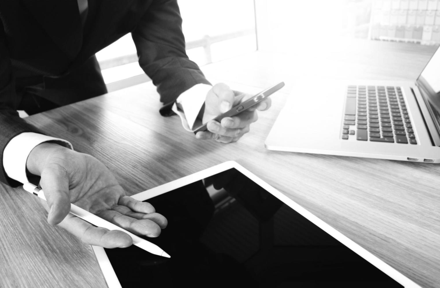 Professional reviewing budget allocation charts and financial planning documents